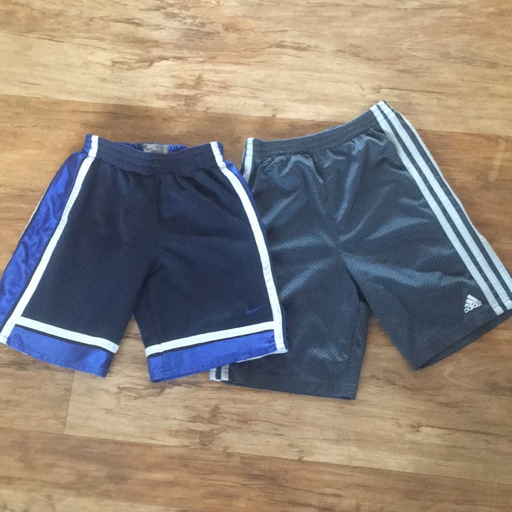 7 Boy 1 Nike and 1 Adidas short.